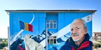 (FOTO) O nouă pictură murală spectaculoasă marca ZIDART în județul Bacău. Exploratorul Teodor Negoiță, readus la viață pe zidul școlii care îi poartă numele