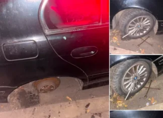 (FOTO) Hoț de roți prins în flagrant de un polițist aflat în timpul liber, la Bacău. Ținta era un BMW