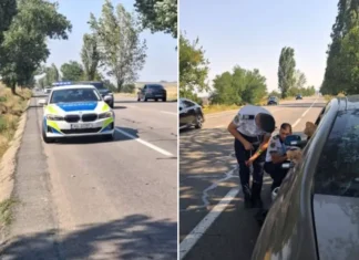 (FOTO) Polițiști de nota 10 pe DN2-E85. Doi agenți din Bacău au ajutat un șofer rămas în pană. „Cinste și respect, domnilor agenți! Vă mulțumim!”