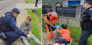 (FOTO) Femeie găsită cu o plagă la față, pe marginea drumului, la Târgu Ocna. Intervenția jandarmilor