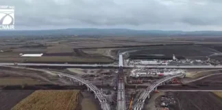 (VIDEO) UMB continuă lucrările pe Autostrada A7 Bacău – Pașcani, în ciuda ploilor. Lotul Săucești – Trifești a ajuns la 71,7%